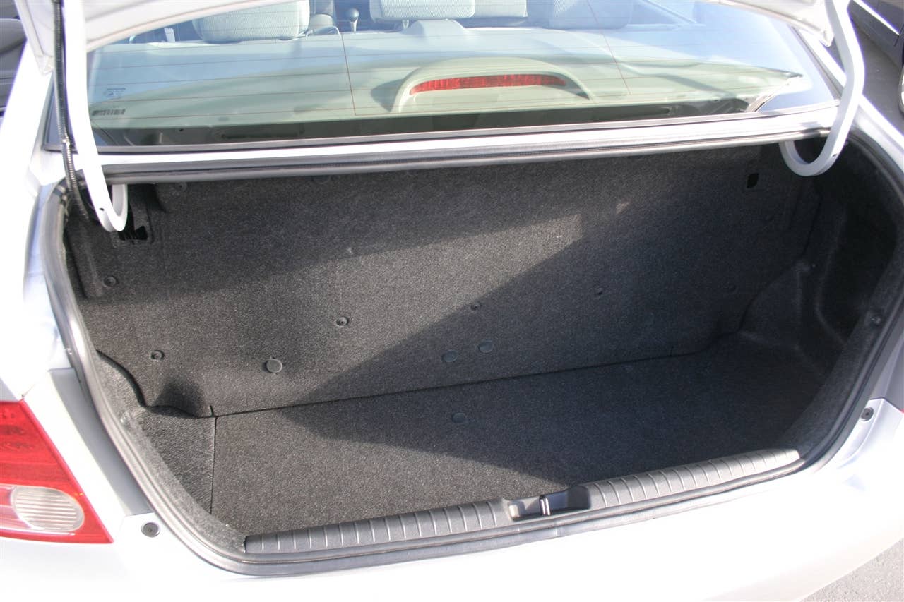 The trunk of the CNG Civic occupied by the fuel tank