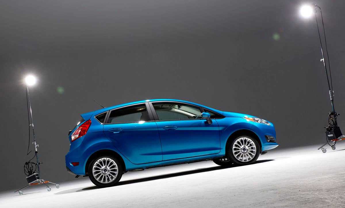 2014 Ford Fiesta 5dr: Offering more than 10 color choices, custom design exterior graphics, a mood-setting selection of ambient lighting and sexy new color options, Fiesta is built to excite the right-brain driver. (11/26/2012)