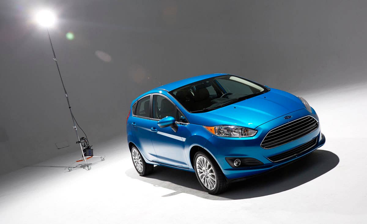 2014 Ford Fiesta 5dr: Offering more than 10 color choices, custom design exterior graphics, a mood-setting selection of ambient lighting and sexy new color options, Fiesta is built to excite the right-brain driver. (11/26/2012)
