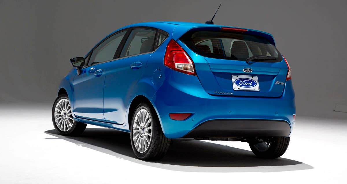 2014 Ford Fiesta 5dr: Offering more than 10 color choices, custom design exterior graphics, a mood-setting selection of ambient lighting and sexy new color options, Fiesta is built to excite the right-brain driver. (11/26/2012)