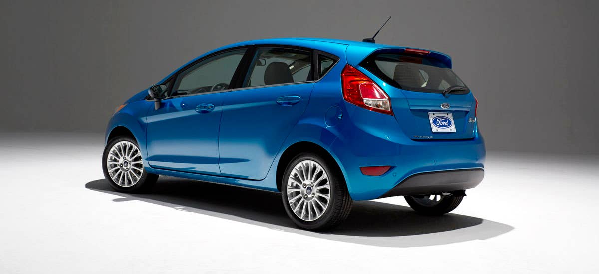 2014 Ford Fiesta 5dr: Offering more than 10 color choices, custom design exterior graphics, a mood-setting selection of ambient lighting and sexy new color options, Fiesta is built to excite the right-brain driver. (11/26/2012)