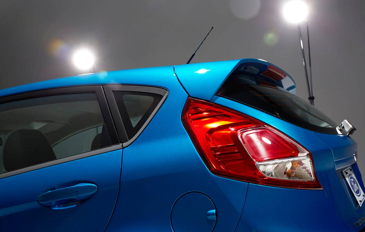 2014 Ford Fiesta 5dr: Offering more than 10 color choices, custom design exterior graphics, a mood-setting selection of ambient lighting and sexy new color options, Fiesta is built to excite the right-brain driver. (11/26/2012)
