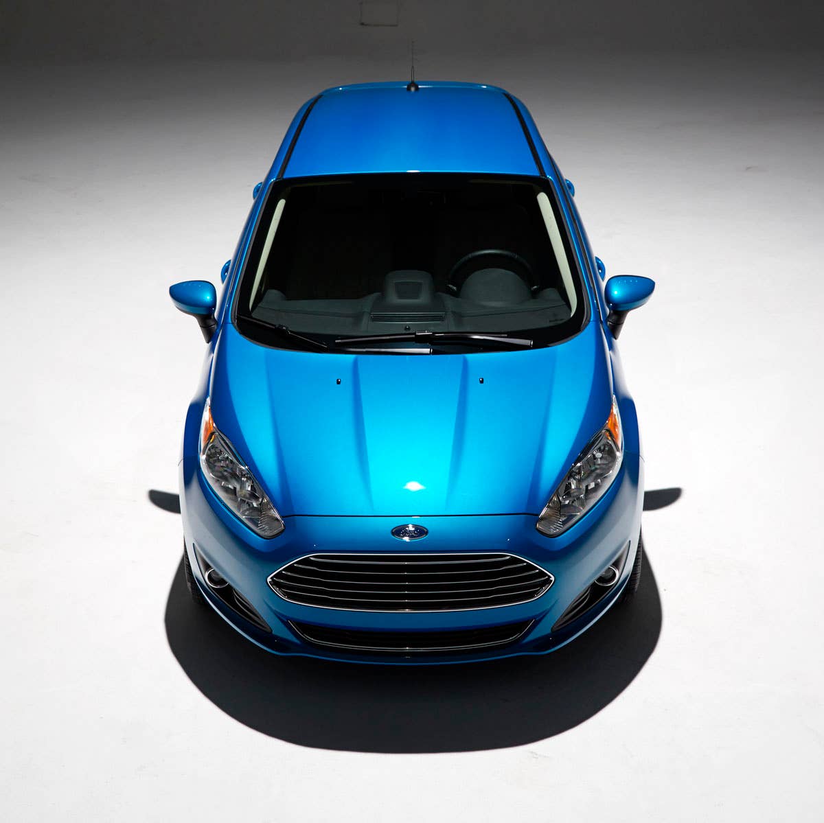 2014 Ford Fiesta 5dr: Offering more than 10 color choices, custom design exterior graphics, a mood-setting selection of ambient lighting and sexy new color options, Fiesta is built to excite the right-brain driver. (11/26/2012)