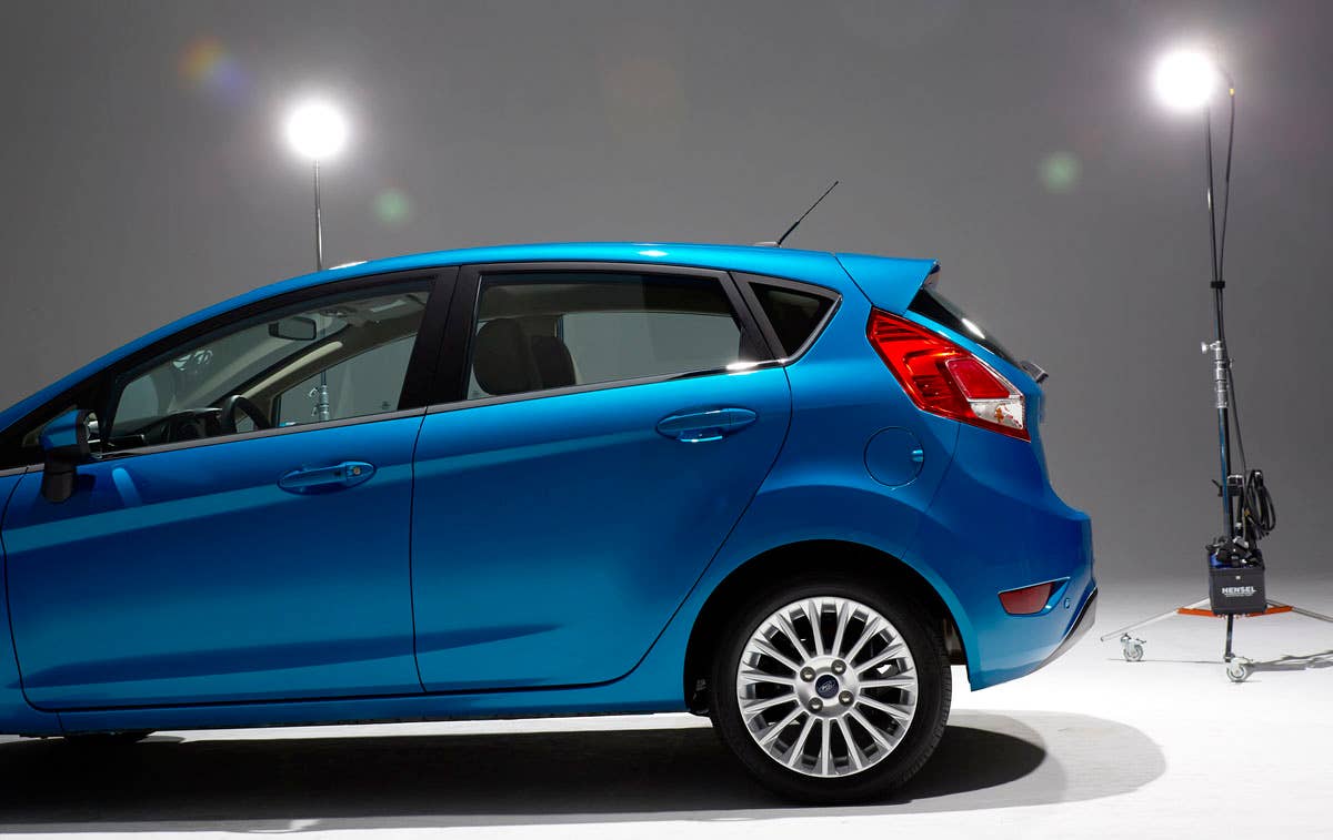 2014 Ford Fiesta 5dr: Offering more than 10 color choices, custom design exterior graphics, a mood-setting selection of ambient lighting and sexy new color options, Fiesta is built to excite the right-brain driver. (11/26/2012)