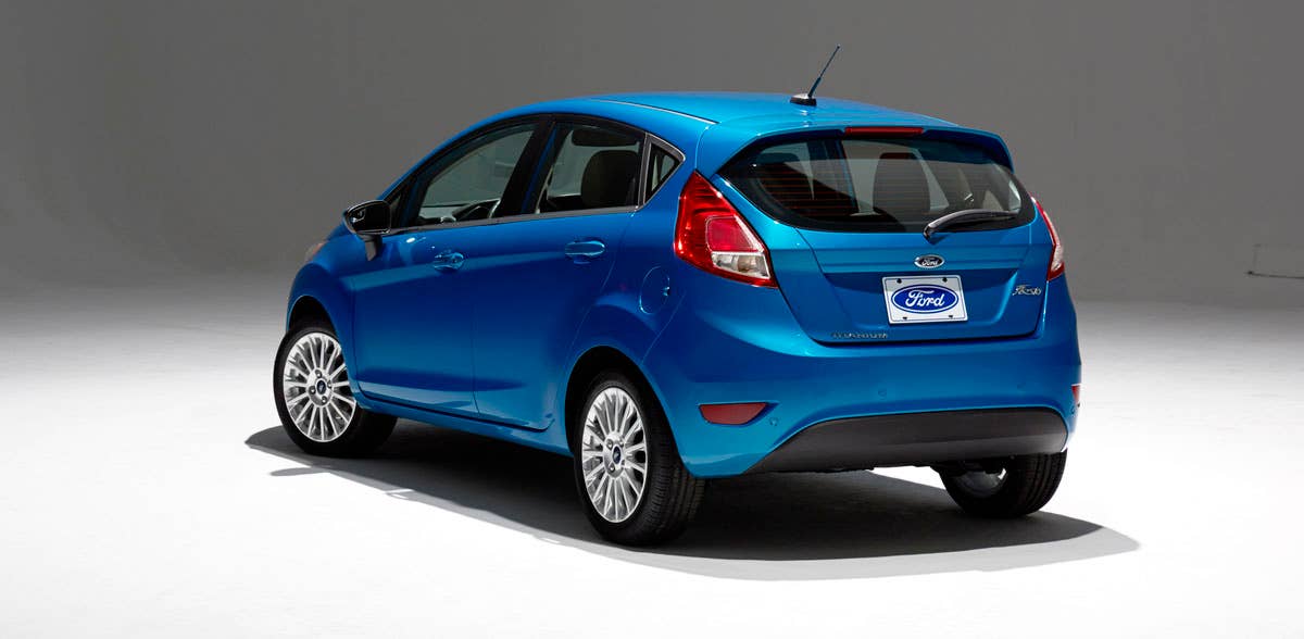 2014 Ford Fiesta 5dr: Offering more than 10 color choices, custom design exterior graphics, a mood-setting selection of ambient lighting and sexy new color options, Fiesta is built to excite the right-brain driver. (11/26/2012)