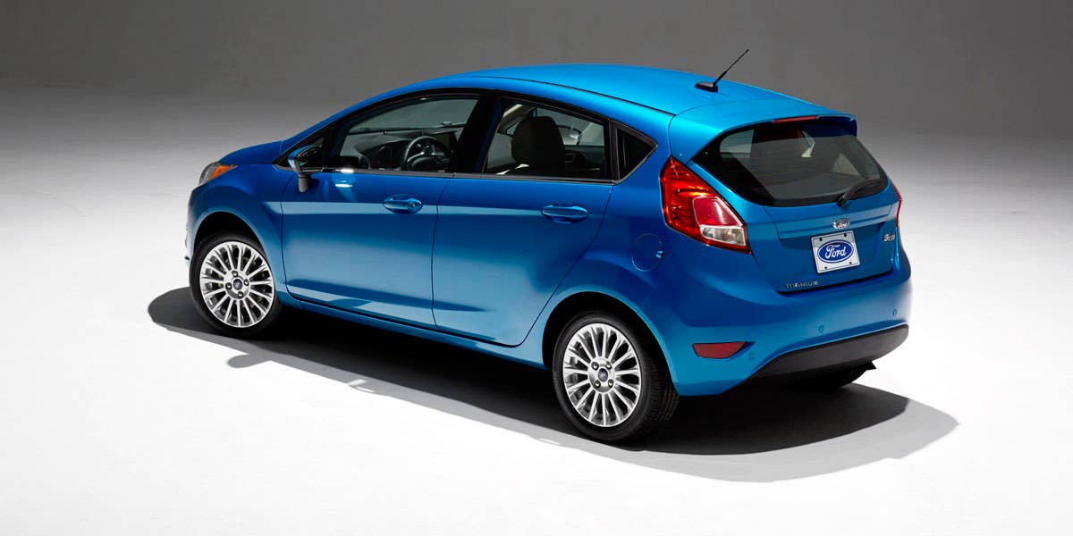 2014 Ford Fiesta 5dr: Offering more than 10 color choices, custom design exterior graphics, a mood-setting selection of ambient lighting and sexy new color options, Fiesta is built to excite the right-brain driver. (11/26/2012)