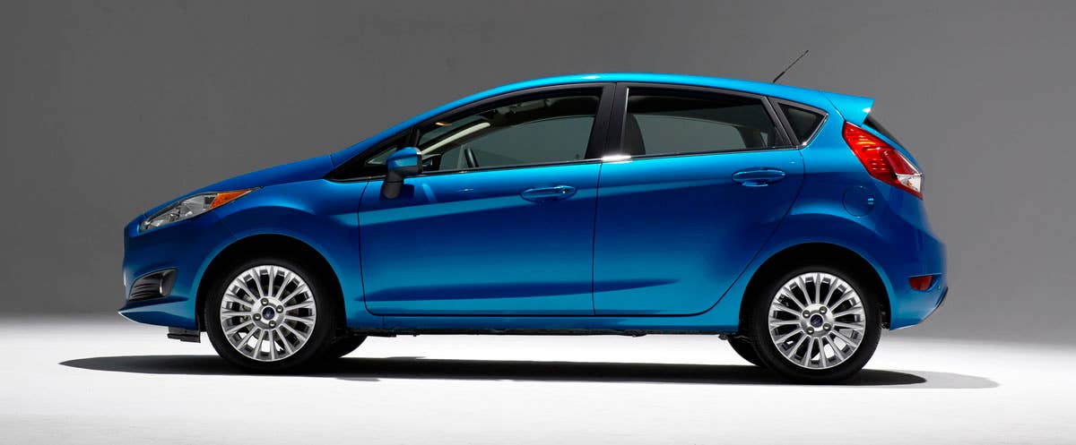 2014 Ford Fiesta 5dr: Offering more than 10 color choices, custom design exterior graphics, a mood-setting selection of ambient lighting and sexy new color options, Fiesta is built to excite the right-brain driver. (11/26/2012)