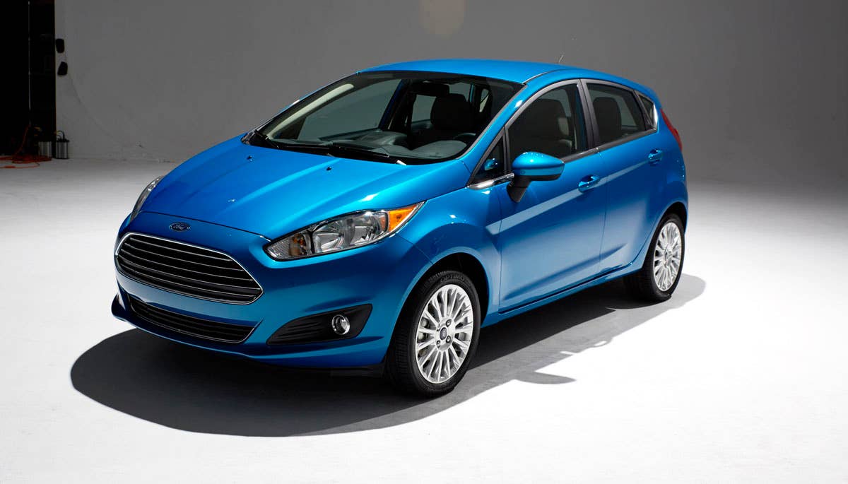 2014 Ford Fiesta 5dr: Offering more than 10 color choices, custom design exterior graphics, a mood-setting selection of ambient lighting and sexy new color options, Fiesta is built to excite the right-brain driver. (11/26/2012)