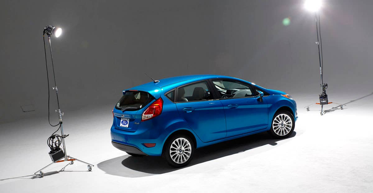 2014 Ford Fiesta 5dr: Offering more than 10 color choices, custom design exterior graphics, a mood-setting selection of ambient lighting and sexy new color options, Fiesta is built to excite the right-brain driver. (11/26/2012)