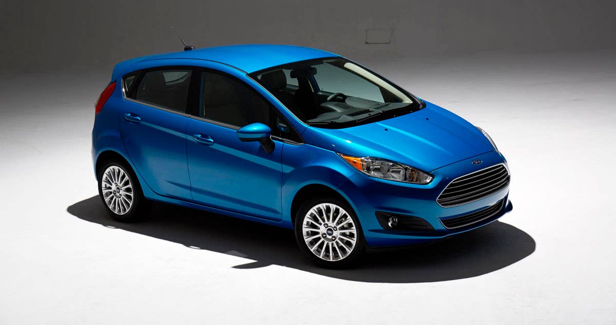 2014 Ford Fiesta 5dr: Offering more than 10 color choices, custom design exterior graphics, a mood-setting selection of ambient lighting and sexy new color options, Fiesta is built to excite the right-brain driver. (11/26/2012)