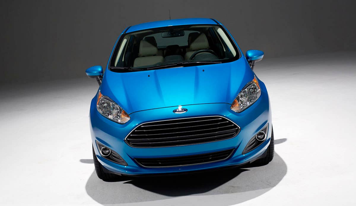 2014 Ford Fiesta 5dr: Offering more than 10 color choices, custom design exterior graphics, a mood-setting selection of ambient lighting and sexy new color options, Fiesta is built to excite the right-brain driver. (11/26/2012)