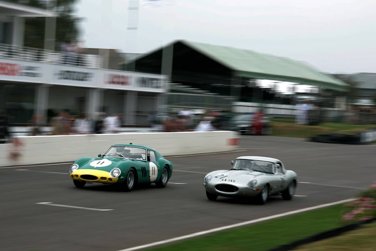 Ferrari 250 GTO and E-type racing down the straight