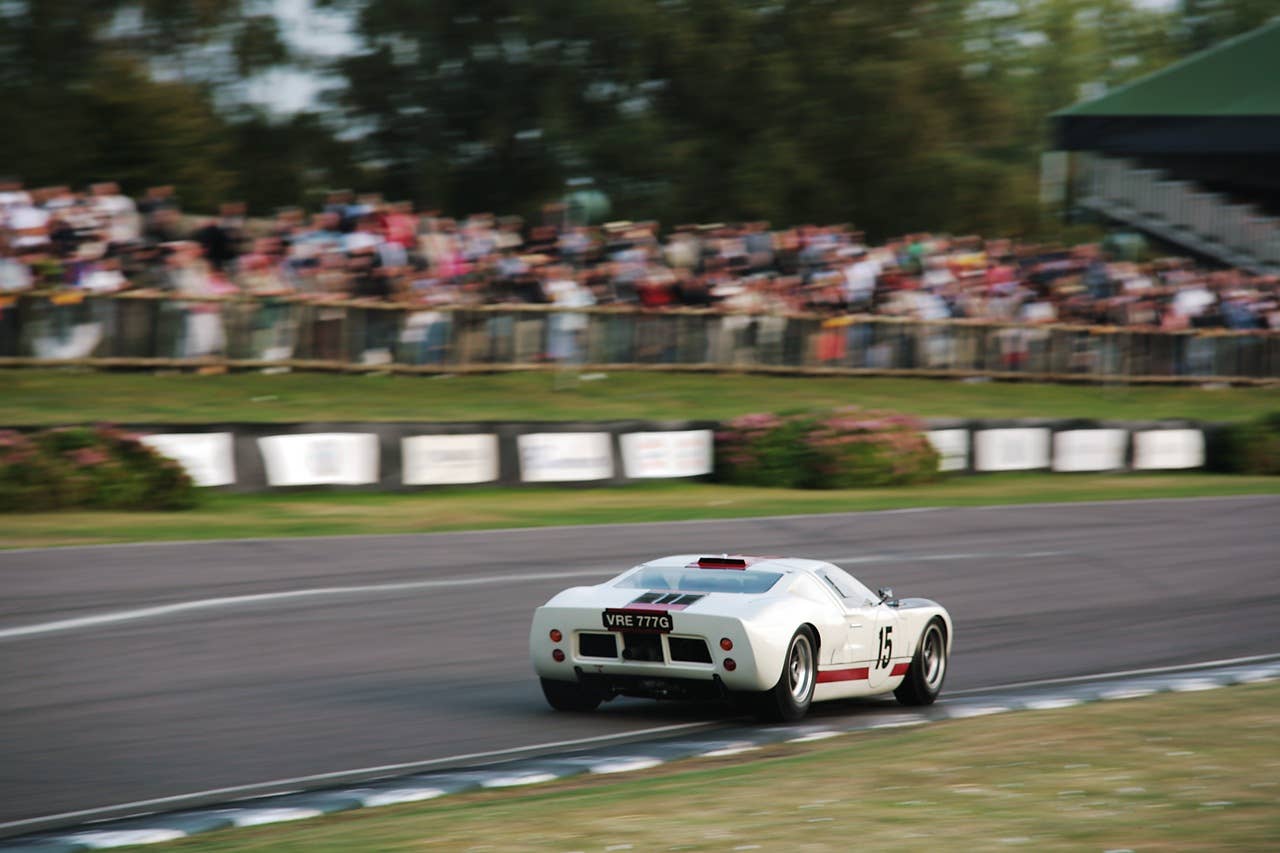 Ford GT40 accelerating onto the main straight
