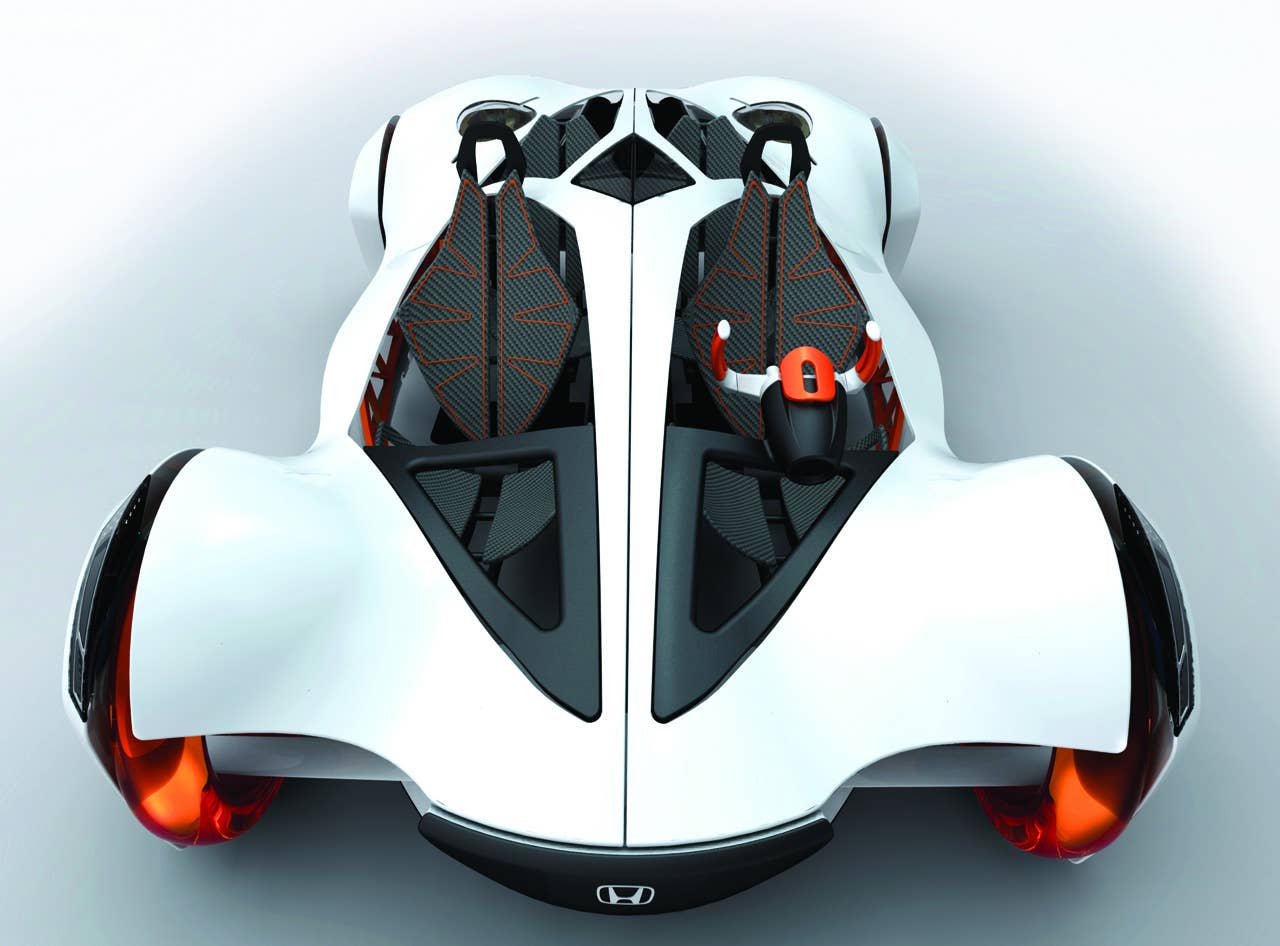 The Honda Air concept is a vision of the future of lightweight and alternative fuel performance vehicles; a coastal cruiser for the aggressive lifestyle. Inspired by the modern roller coaster as well as skydiving wing-suits, the Air is powered by a compressed air and pneumatic regulator system.