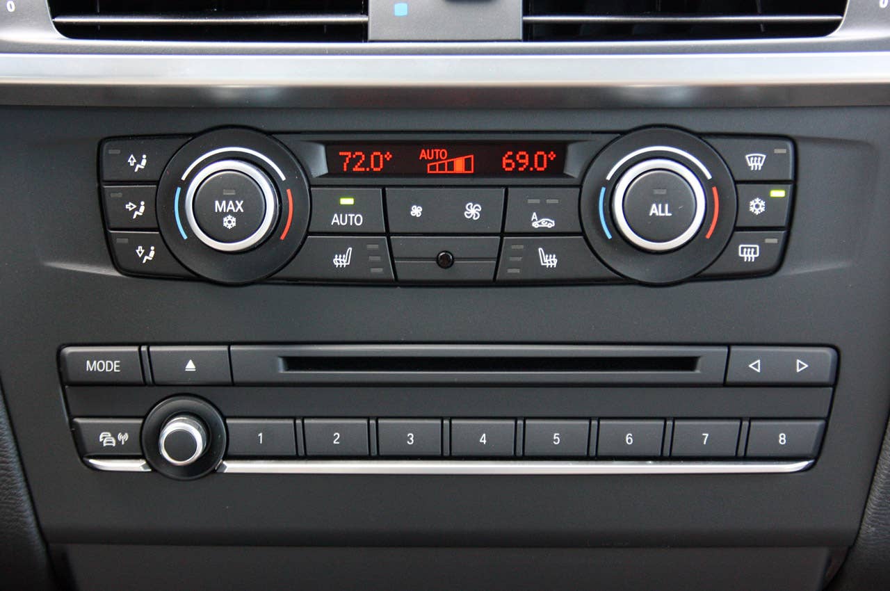 2011 BMW X3 climate and stereo controls