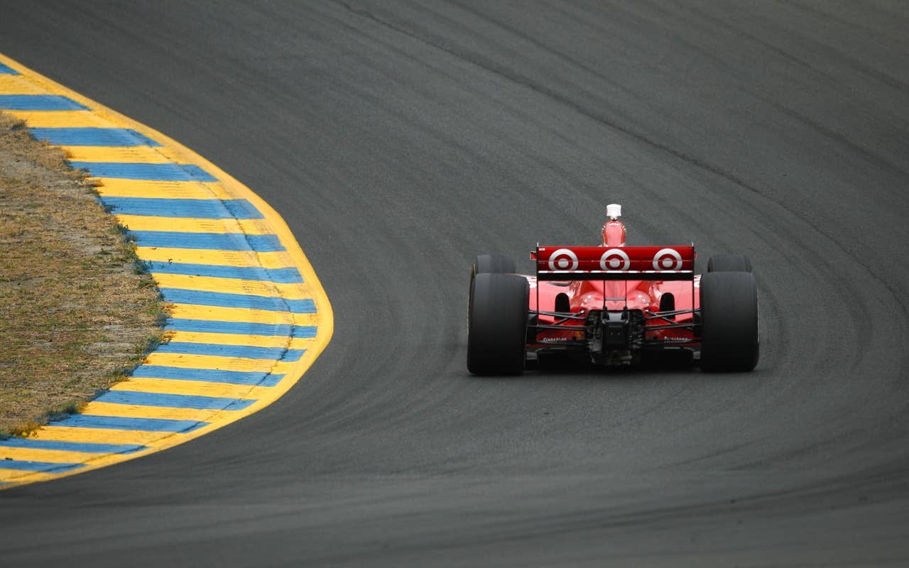 SONOMA, CA - AUGUST 21:  Scott Dixon of New Zealand, driver of the #9 Target Chip Ganassi Dallara Honda, looks on from the pits during practice for the IZOD IndyCar Series Grand Prix of Sonoma at Infineon Raceway on August 21, 2010 in Sonoma, California. (Photo by Donald Miralle/Getty Images) *** Local Caption *** Scott Dixon