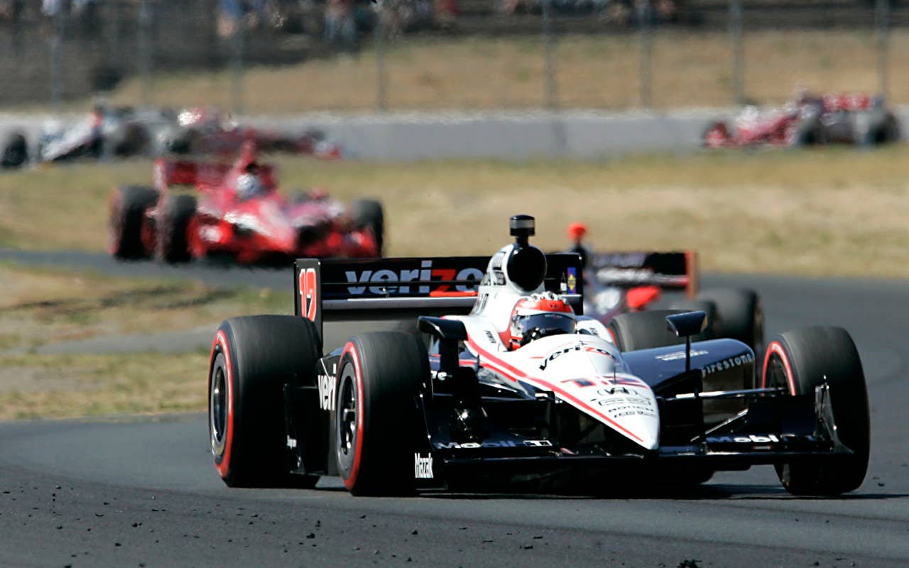 Pole sitter Will Power, of Australia,  leads the pack in the opening laps of the  Indy Grand Prix of Sonoma, at the Infineon Raceway in Sonoma, Calif. Sunday, Aug. 22, 2010.(AP Photo/Rich Pedroncelli)