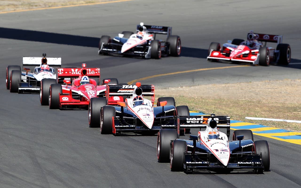 SONOMA, CA - AUGUST 22:  Will Power of Australia, driver of the #12 Verizon Team Penske Dallara Honda leads the field during the IZOD IndyCar Series Grand Prix of Sonoma at Infineon Raceway on August 22, 2010 in Sonoma, California.  (Photo by Christian Petersen/Getty Images)