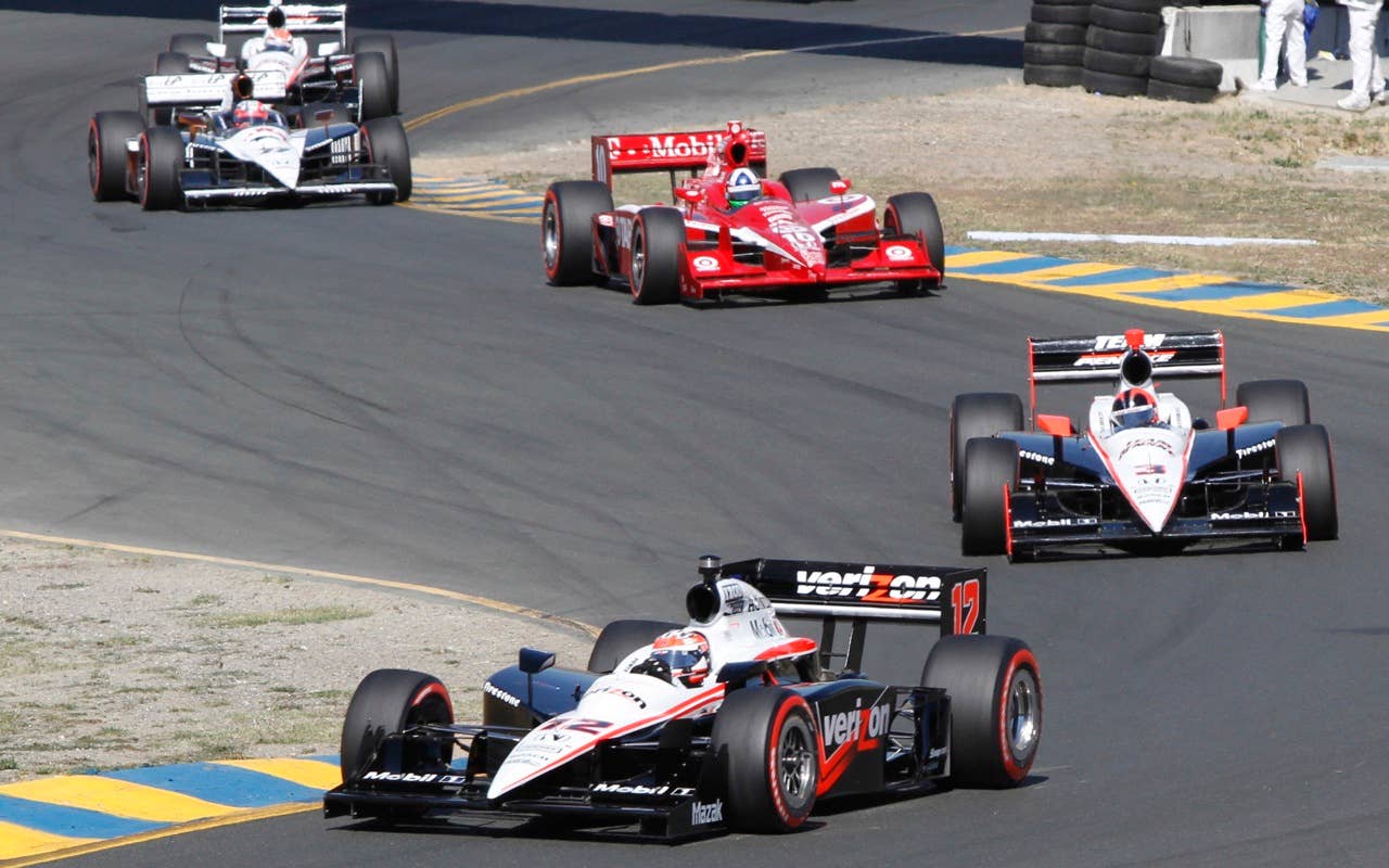 IndyCar driver Will Power of Australia leads Helio Castroneves of Brazil and Dario Franchiti of Scotland in the Indy Grand Prix of Sonoma, Sunday, Aug. 22, 2010 at Infineon Raceway in Sonoma, Calif. (AP Photo/George Nikitin)
