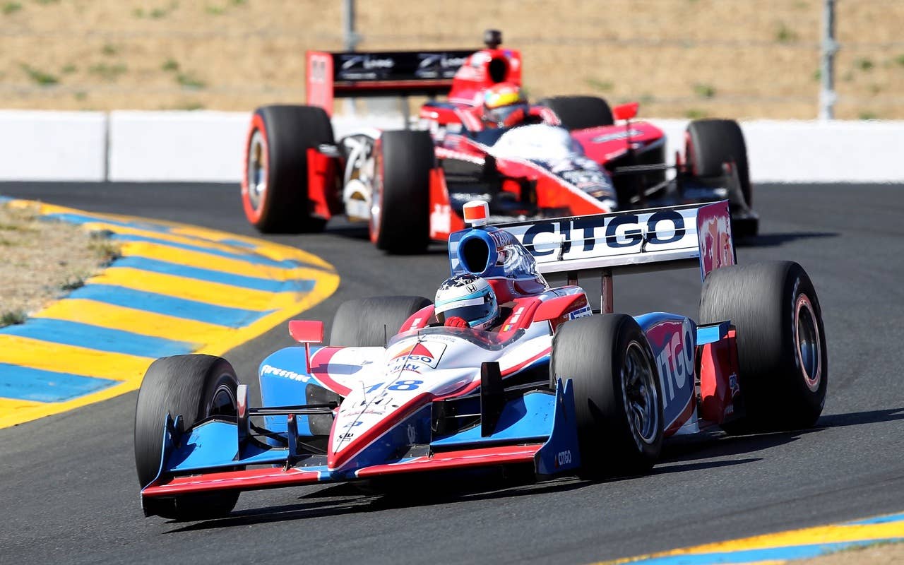 SONOMA, CA - AUGUST 22:  Milka Duno of Venezuela, driver of the #18 CITGO Dallara Honda and Justin Wilson of England, driver of the #22 Team Z-Lines Designs Dallara Honda during practice for the IZOD IndyCar Series Grand Prix of Sonoma at Infineon Raceway on August 22, 2010 in Sonoma, California.  (Photo by Christian Petersen/Getty Images)