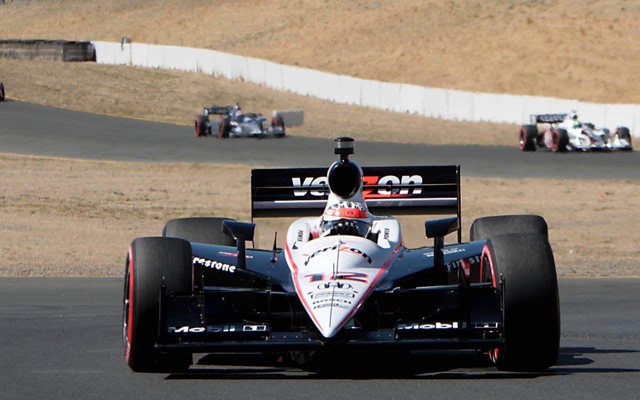 Pole sitter Will Power, of Australia,  leads the pack in the opening laps of the  Indy Grand Prix of Sonoma, at the Infineon Raceway in Sonoma, Calif. Sunday, Aug. 22, 2010.(AP Photo/Rich Pedroncelli)