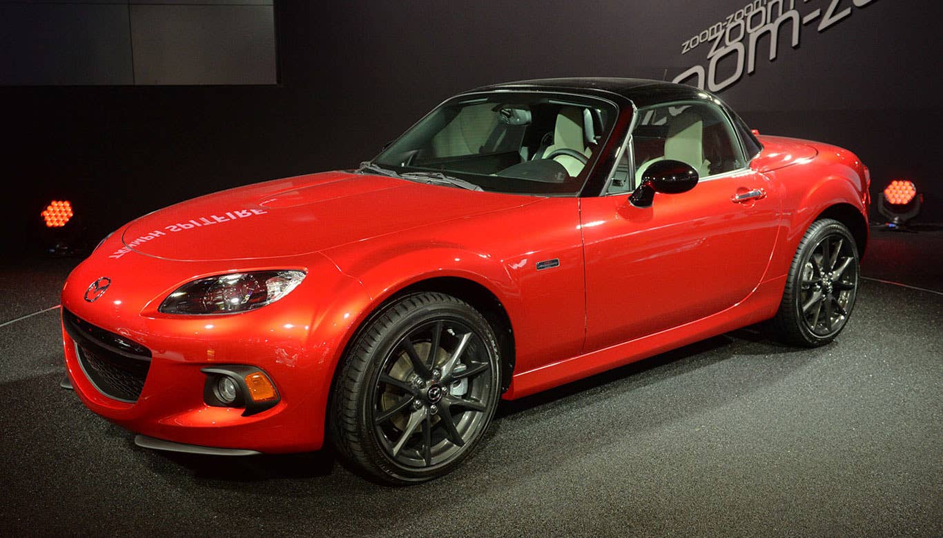 The 25th Anniversary Miata isn't really much of a new car, but it made our list because it represents our favorite display of the entire show. To celebrate 25 years of Miata, Mazda showed off 15 old models and concepts, as well as the chassis of the yet-to-be-revealed next-gen roadster. It was truly a sight to behold.  The 25th Anniversary Edition Miata comes in a striking red color with contrasting black accents. The hardtop convertible will also come with either a manual or automatic transmission, Bilstein shocks and an off-white leather interior.  Read More Mazda MX-5 Miata 25th Anniversary Edition Information Mazda MX-5 Miata 25th Anniversary Edition Photos