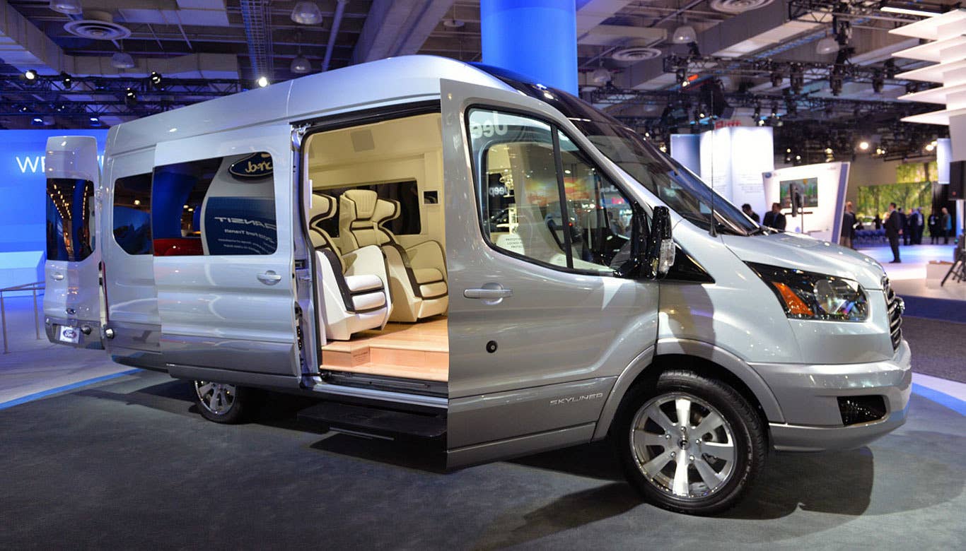 This luxed-out van was one of our favorite sights at this year's show. The Ford Transit Connect Skyline Edition comes with four finely crafted captain's buckets that can be moved into different formations based on need. The seats can be swung around to face a 52-inch screen if riders want to watch a movie. A table can be popped up, if you need to get some business done. And there's even a configuration for tailgating.  The materials are way plush and there is a ton of room. The leather seats and wood floors look great. The vehicle comes with customized luggage in the trunk, too.  Read More Ford Transit Connect Skyline Edition Information Ford Transit Connect Skyline Edition Photos