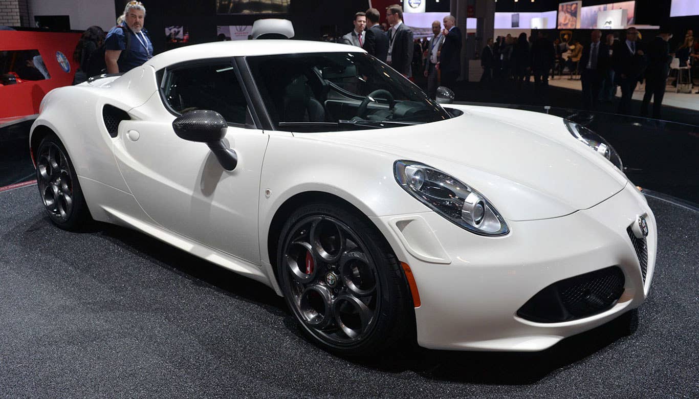 The Alfa Romeo 4C marks the return of the Italian brand to our shores. This little coupe should be fun to drive, as it's super-lightweight, mid-engined, turbocharged and with non-power-assisted steering.  It's also quite visually striking, with lots of curves conveying the car's super sporty demeanor. Pricing could be an issue for this car. According toCar & Driver, the first 4C models to hit American pavement will cost around $86,000. That's a good deal more expensive than its closest competitor, the Porsche Boxster and about the same as a low-end 911 or loaded Cayman.  Read More Alfa Romeo 4C Information Alfa Romeo 4C Photos