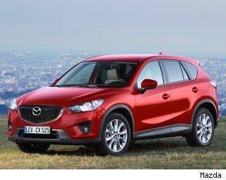 MSRP: $21,195 - $28,870 Invoice: $20,589 - $28,039 Fuel Economy: 26 mpg city, 35 mpg highway  Recently released for the 2013 model year, the Mazda CX-5, which has replaced the CX-7, is one of our favorite crossovers on the road right now. With great fuel economy, superb driving dynamics and attractive sheet metal, crossover buyers should absolutely give this car a test drive.  Research the Mazda CX-5 Mazda CX-5 Photos & Information Mazda CX-5 Best Deals Mazda CX-5 Local Dealer Price Quote