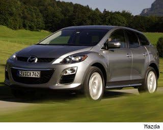 MSRP: $22,190 - $33,540 Invoice: $21,555 - $32,066 Fuel Economy: 20 mpg city, 27 mpg highway  The CX-7 was made redundant by the introduction of a new vehicle: The Mazda CX-5. The CX-5 comes with about the same versatility as the CX-7, but has better fuel economy, looks and driving dynamics.  Research the Mazda CX-7 Mazda CX-7 Photos & Information Mazda CX-7 Specs Mazda CX-7 Local Dealer Price Quote
