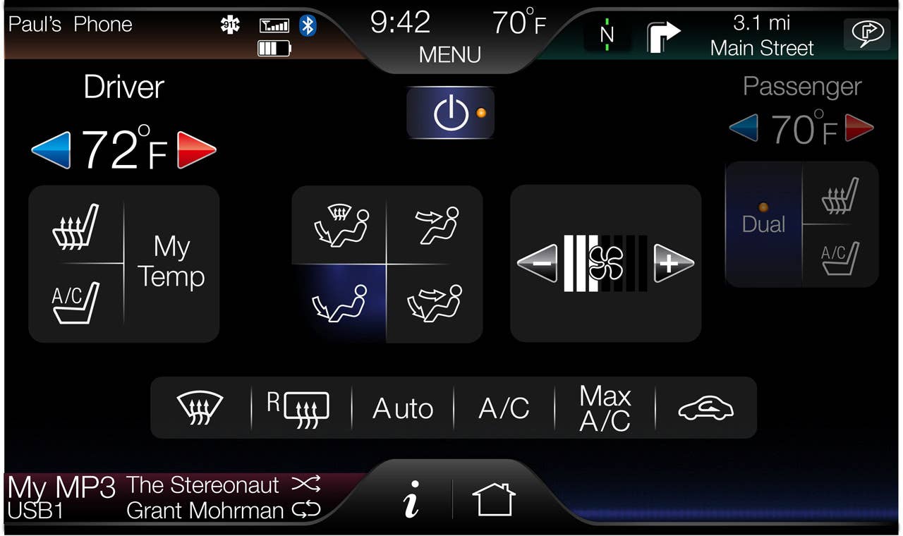 The 8-inch touch-screen center stack display is the key interface on MyFord Touch, shown here with the climate control screen active.
