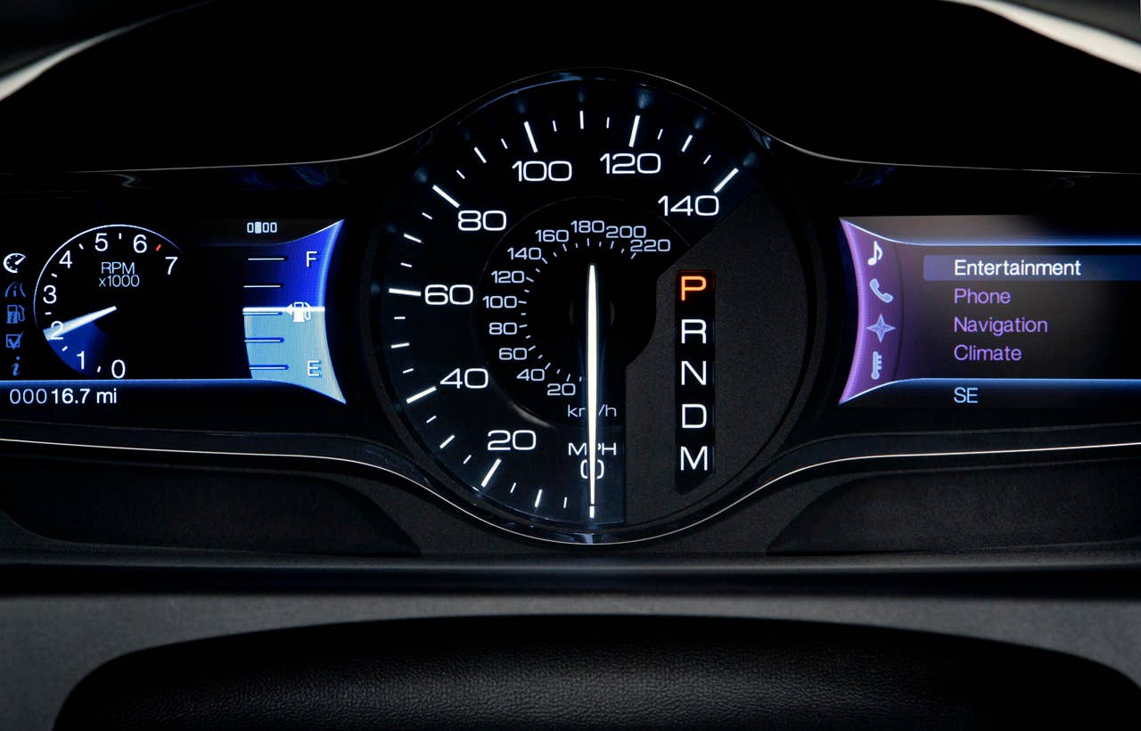 MyFord Touch displays much of its information using two 4.2-inch full-color LCD screens flanking an analog speedometer.