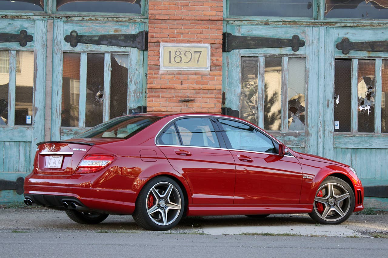 2011 Mercedes-Benz C63 AMG Performance Pack rear 3/4 view