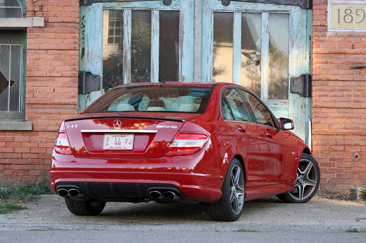 2011 Mercedes-Benz C63 AMG Performance Pack rear 3/4 view