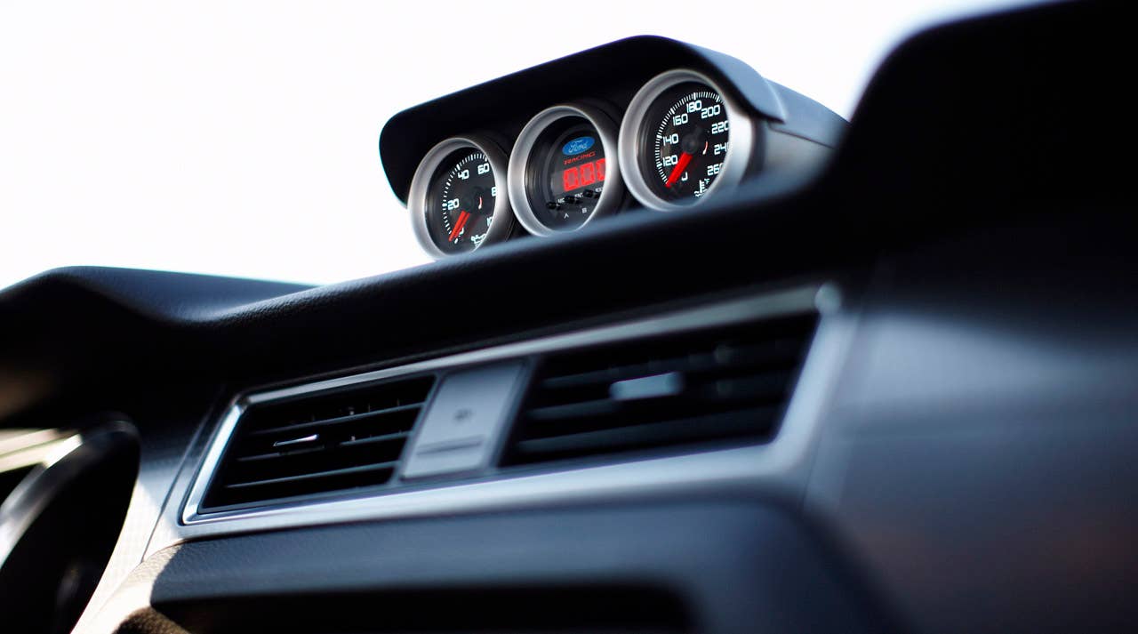 2012 Ford Mustang Boss 302 Laguna Seca: A special gauge package helps set the Laguna Seca interior apart from standard Mustang models. (08/13/2010)