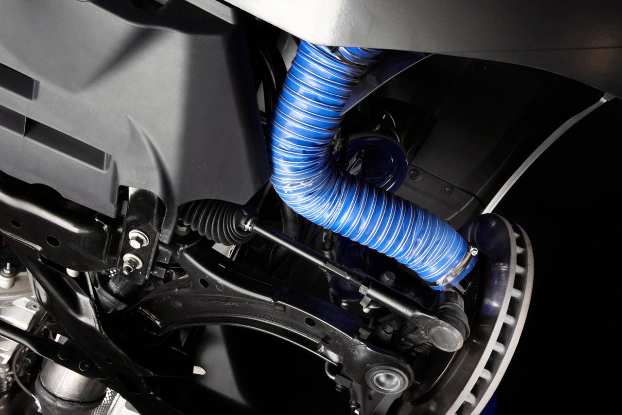 2012 Ford Mustang Boss 302 Laguna Seca: 2012 Mustang Boss 302 Laguna Seca comes with Ford Racing brake cooling ducts that direct cooling air onto brake rotors for reduced fade and better brake feel - also available for standard Boss models. (08/13/2010)