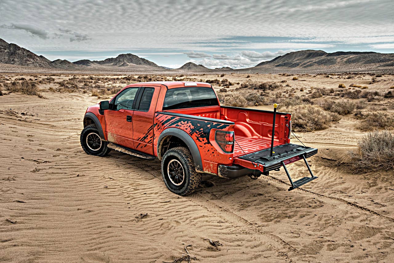 2010 F-150 SVT Raptor: Ford's Special Vehicle Team (SVT) taps into growing off-road enthusiast market and builds on the solid foundation of the new Ford F-150 to deliver the ultimate off-road performance truck - the 2010 Ford F-150 SVT Raptor. (8/14/09)
