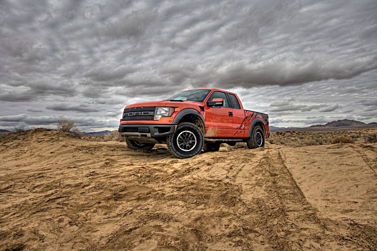 2010 F-150 SVT Raptor: Ford's Special Vehicle Team (SVT) taps into growing off-road enthusiast market and builds on the solid foundation of the new Ford F-150 to deliver the ultimate off-road performance truck - the 2010 Ford F-150 SVT Raptor. (8/14/09)