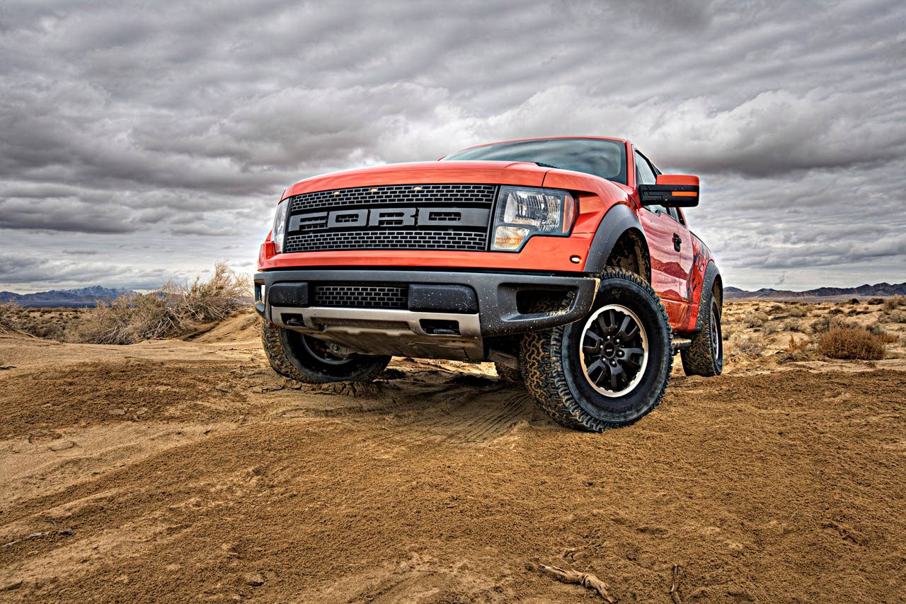 2010 F-150 SVT Raptor: Ford's Special Vehicle Team (SVT) taps into growing off-road enthusiast market and builds on the solid foundation of the new Ford F-150 to deliver the ultimate off-road performance truck - the 2010 Ford F-150 SVT Raptor. (8/14/09)