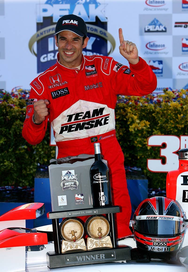 SONOMA, CA - AUGUST 24: Helio Castroneves driver of the #3 Team Penske Dallara Honda celebrates winning the IRL IndyCar Series PEAK Antifreeze & Motor Oil Indy Grand Prix of Sonoma County on August 24, 2008 at the Infineon Raceway in Sonoma, California. (Photo by Darrell Ingham/Getty Images)