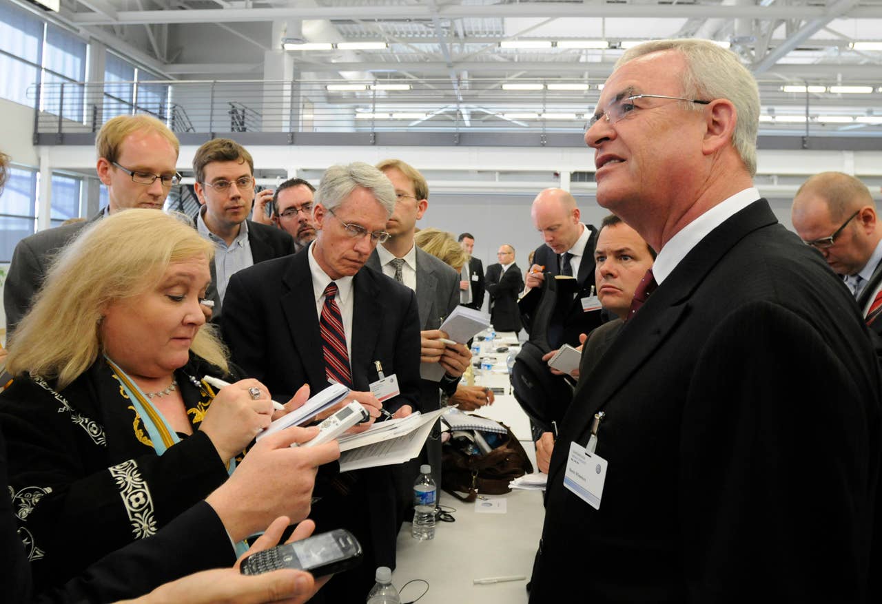 Martin Winterkorn, Chairman of the Board of Management of Volkswagen AG, right, addresses the media as Volkswagen hosts a grand opening of its new plant and to launch its all-new Passat in Chattanooga, Tenn. on Tuesday, May 24, 2011. Volkswagen is jumping into the U.S. auto market with a new Passat that is bigger, cheaper and built domestically in hopes of breaking into the competitive midsize sedan market. (AP Photo/Billy Weeks)