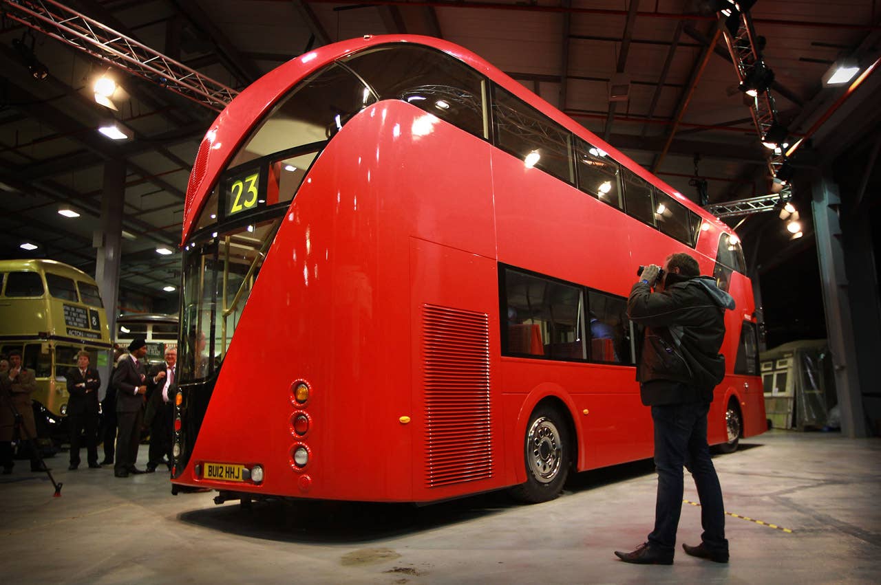 LONDON, ENGLAND - NOVEMBER 11:  A mock up of the New Bus for London is shown to reporters at  Acton on November 11, 2010 in London, England. The new bus design mimics some of the features of the iconic red London Routemaster bus and is scheduled to come into service in 2012. The original Routemaster was introduced in 1956 and a number of them are still in use on heritage routes in London, following their withdrawal from regular routes in 2005.  (Photo by Peter Macdiarmid/Getty Images)