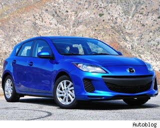 The Mazda3 SKYACTIV is a small 4-door sedan or hatchback that combines sporty driving dynamics, a sleek appearance, affordable price and great fuel economy all into one package. The refreshed Mazda3 comes with a few significant changes for the 2012 model year. The infamous"smiley" grille has been toned down quite a bit in order to reduce drag. Inside, the cabin has been refreshed with new blackened trim and instrument panel accent lighting, which changes based on your driving performance. The most notable change, however, is under the hood and comes in the form of the SKYACTIV engine. To spare you the boring details, it essentially produces more horsepower and delivers better fuel economy than the previous generation. At least, that's what it does on paper. I took the Mazda3 SKYACTIV sedan for some real world driving, including a LA-San Diego jog, to see if fuel economy and sporty driving can truly coexist. Research the Mazda3 Mazda3 Photos & Information Mazda3 Specs Mazda3 Local Dealer Price Quote