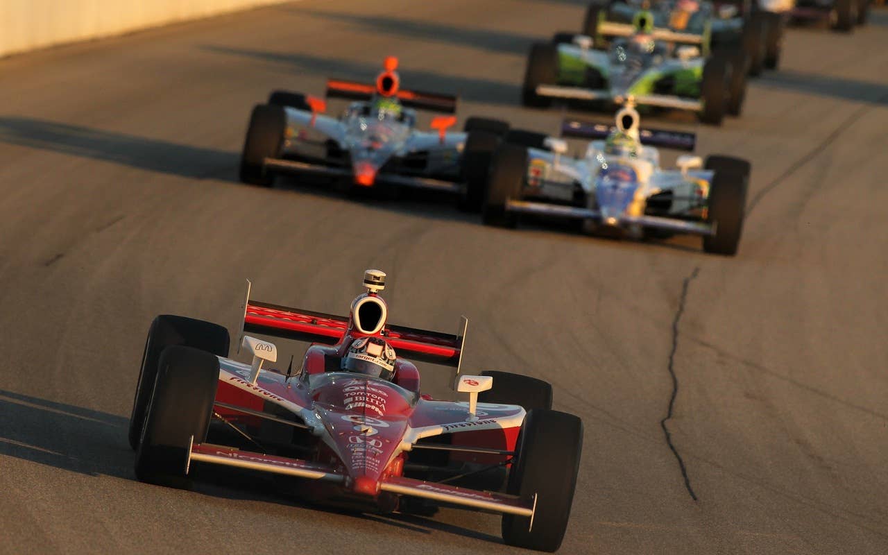 JOLIET, IL - AUGUST 28:  Scott Dixon of New Zealand drives the #9 Target Chup Ganassi Racing Dallara Honda during the Indy Car Series PEAK Antifreeze and Motor Oil Indy 300 on August 28, 2010 at Chicagoland Speedway in Joliet, Illinois.  (Photo by Jonathan Ferrey/Getty Images) *** Local Caption *** Scott Dixon