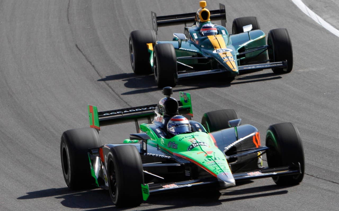 Danica Patrick, left, and Takuma Sato of Japan, drive their car during Indy Car final practice for the Peak Antifreeze and Motor Oil Indy 300 auto race at ChicagoLand Speedway in Joliet, Ill., Friday, Aug. 27, 2010. (AP Photo/Nam Y. Huh)