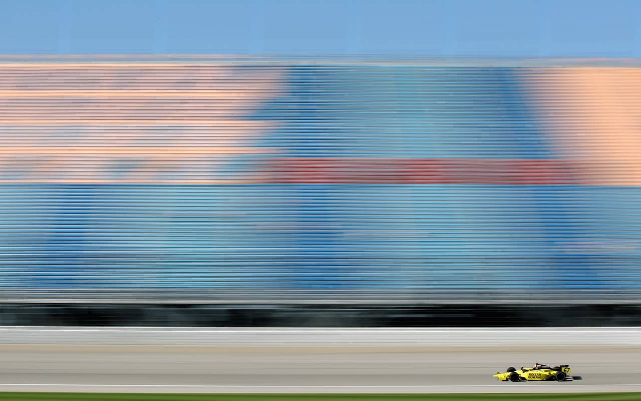 CHICAGO - AUGUST 27:  Sarah Fisher, driver of the #67 Dollar General Dallara Honda, during practice for the IndyCar Series PEAK Antifreeze and Motor Oil Indy 300 at Chicagoland Speedway on August 27, 2010 in Chicago, Illinois.  (Photo by Streeter Lecka/Getty Images)  *** BEST PIX *** *** Local Caption *** Sarah Fisher