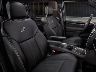 On the inside, Chrysler is trying to stick with the black theme. The seats are black leather with an"S" logo embroidered on the backs. There's also grey stitching on the seats and arm rests, and the instrument panel is glossy black.  Chrysler has also put a new Blu-Ray DVD system in the back with HDMI inputs, which lets passengers in the back watch high-definition movies or play video games on the go. Blissfully, these systems also come with wireless headphones, so the driver doesn't have to listen in.