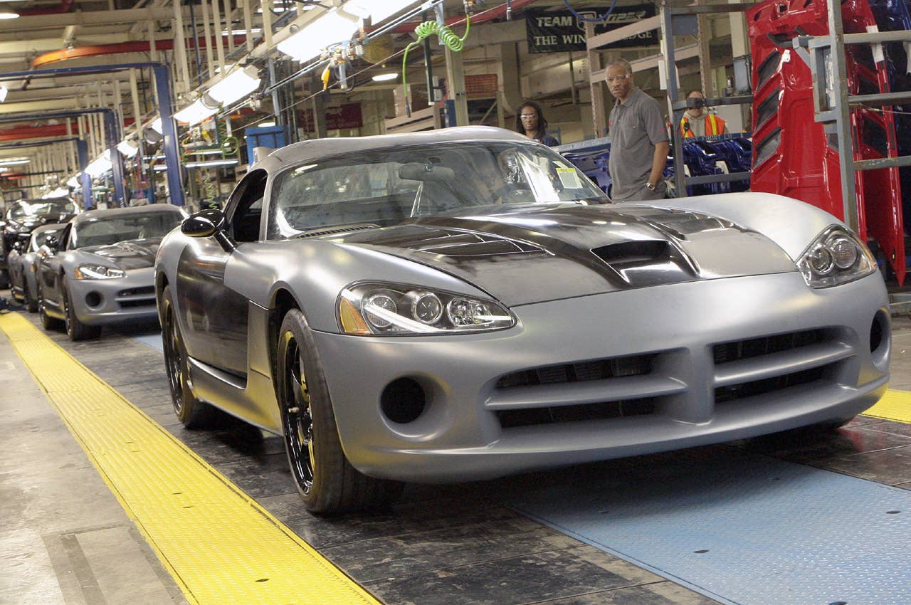 Detroit - March 29, 2010 - Conner Avenue Assembly Plant employees complete the production launch of 25 spec-series 2010 Viper SRT10 ACR-X models as the car became the first of the 2010-model-year Dodge Vipers completed at the plant. Built for road-racing enthusiasts, the Dodge Viper ACR-X combines the best performance attributes of the record-setting, street-legal Dodge Viper ACR (American Club Racer) and the safety equipment of championship-winnning Viper Competition Coupes. "With its amazing on-track performance, the Viper ACR-X is going to seriously turn the heads of all road-racing enthusiasts, whether it is the grassroots driver all the way up to the professional," Gilles said.   Viper ACR-X is to debut in the Dodge Viper Cup spec-racing series in July. (Joe Wilssens photo)