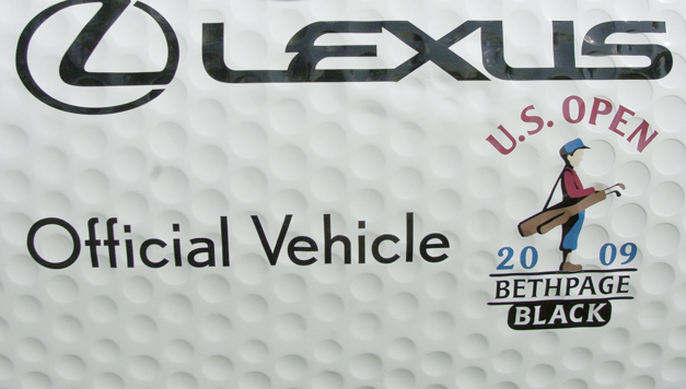 The passenger side door panel of the Lexus 460L shows the creation and work of Brad Smith and Rick and Sam Davis who were contracted by Lexus to fit the car with the plastic composite panels to make the car look like a golf ball. GAVIN JACKSON/The Lima News