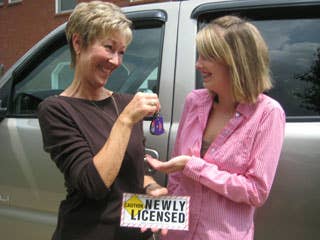 More than 15,000 of people have ordered the signs since Kessler and a group of other moms introduced them four years ago. Here, Kessler family friend Sheila Burns passes the keys to her granddaughter, Kayla.Research More on Teen Driving SafetyMom Develops Safe "Teen Driving" SignCar SafetySafest Used Cars For Teens